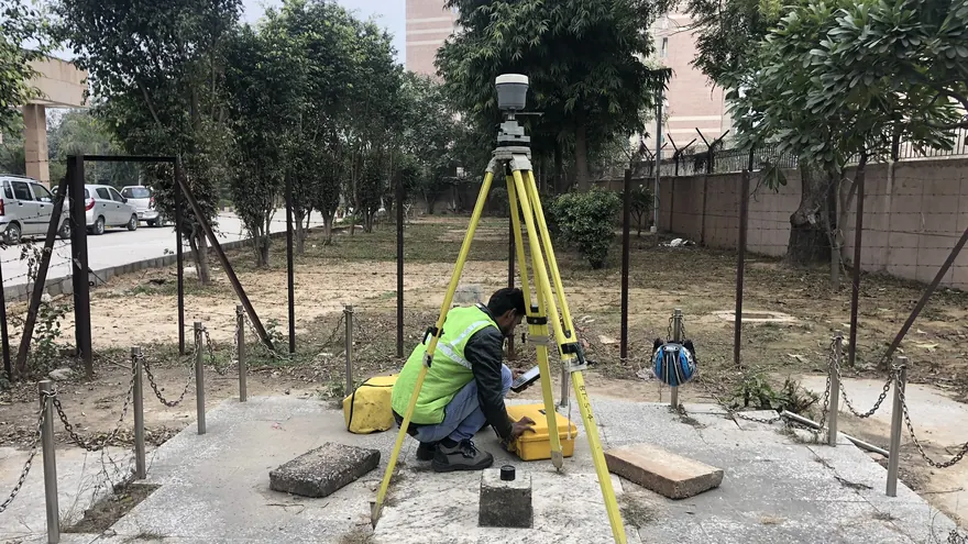 GNSS antenna over a survey mark — the control observation that positions the radar lines, not the radar acquisition itself; representative BTPL fieldwork