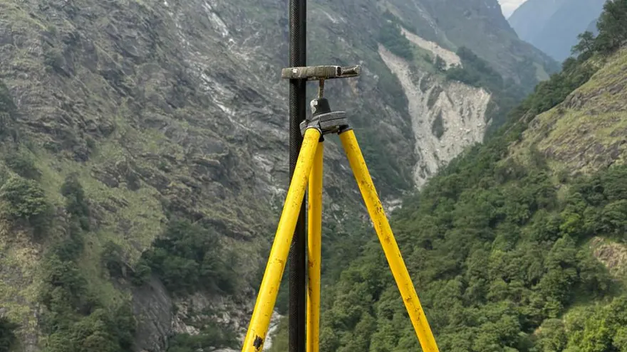 Steep rocky slope above a valley — a representative BTPL field image, not one of the seven sites